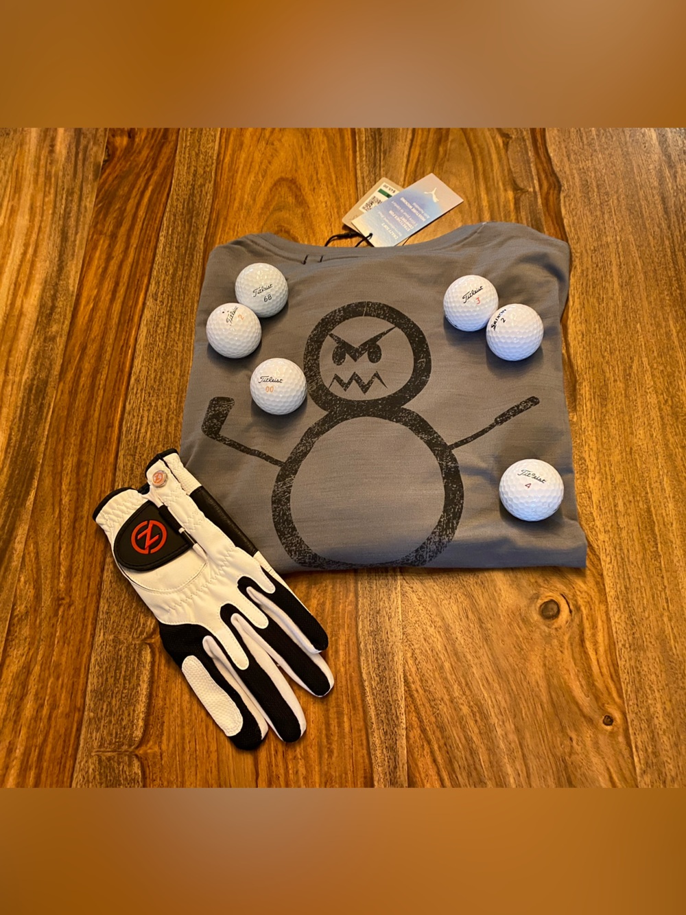 Puma Gray Angry Snowman Graphic Golf Tee , balls,  Zero RestrictionsGolf Glove.